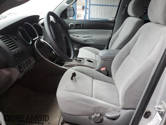 2007 Toyota Tacoma z VIN 5TEMU52NX7Z338432, wystawiony jako Copart lot #55851235 z przebiegiem 194 976 mil mil oraz Szkoda całkowita • Salvage title. Historia ofert i sprzedaży dostępna na DreamBid. Obrazek 7.