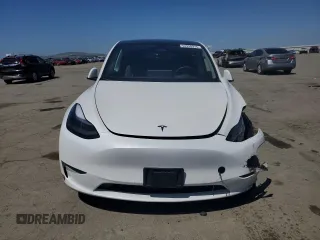 2024 Tesla Model Y Long Range с VIN 7SAYGDEE6RF157415, выставлен на аукционе Copart как лот 54950915 с пробегом 20 567 миль миль и Списание • Salvage title. История ставок и продаж доступна на DreamBid. Изображение 5.