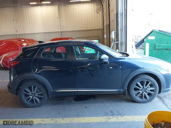 2018 Mazda CX-3 Grand Touring with VIN JM1DKFD77J0300612, listed as a IAAI auction lot 41322923 with 49,830 mi miles. Bid and sale history available at carsss.com. Image 13.