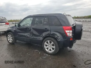 2009 Suzuki Grand Vitara z VIN JS3TE149794100133, wystawiony jako Copart lot #52919795 z przebiegiem 207 928 mil mil oraz Szkoda całkowita • Salvage title. Historia ofert i sprzedaży dostępna na DreamBid. Obrazek 2.