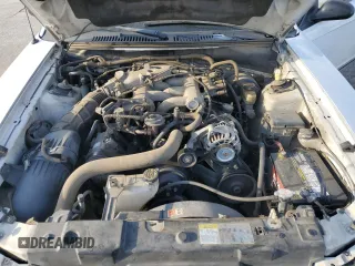 2004 Ford Mustang Deluxe with VIN 1FAFP44634F136739, listed as a Copart auction lot 44078925 with 105,591 mi miles and Salvage Title. Bid and sale history available at carsss.com. Image 11.