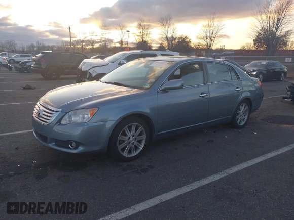 2010 Toyota Avalon XL with VIN 4T1BK3DB1AU363817, listed as a IAAI auction lot 41010053 with 259,106 mi miles and . Bid and sale history available at carsss.com. Image 19.