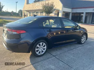 2021 Toyota Corolla LE with VIN JTDEPMAE3MJ123908, listed as a Copart auction lot 77035554 with 45,056 mi miles and Clean Title. Bid and sale history available at DreamBid. Image 4.