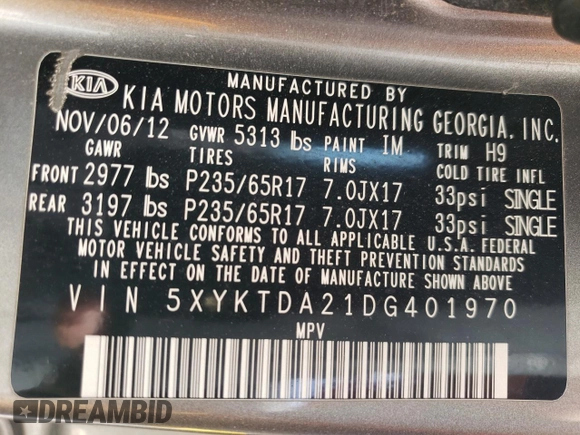 2013 Kia Sorento LX with VIN 5XYKTDA21DG401970, listed as a Copart auction lot 54079365 with 217,969 mi miles and Salvage title. Bid and sale history available at DreamBid. Image 14.