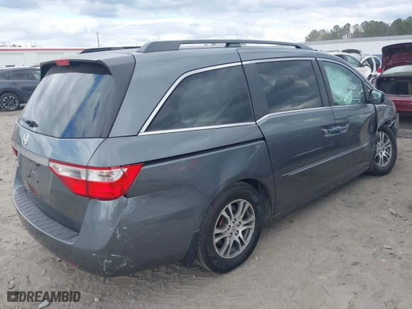 2011 Honda Odyssey EX-L with VIN 5FNRL5H61BB097069, listed as a IAAI auction lot 41723100 with 252,529 mi miles. Bid and sale history available at carsss.com. Image 4.