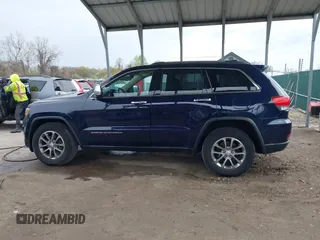 2014 Jeep Grand Cherokee Limited with VIN 1C4RJFBG4EC347208, listed as a IAAI auction lot 41982209 with 124,663 mi miles and . Bid and sale history available at DreamBid. Image 14.