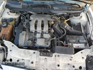 1999 Ford Taurus SE z VIN 1FAFP58S3XG308764, wystawiony jako Copart lot #43959225 z przebiegiem 120 936 mil mil oraz Szkoda całkowita • Salvage title. Historia ofert i sprzedaży dostępna na DreamBid. Obrazek 11.