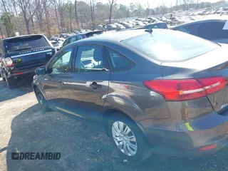 2017 Ford Focus S z VIN 1FADP3E29HL269607, wystawiony jako IAAI lot #41654836 z przebiegiem 101 645 mil mil oraz . Historia ofert i sprzedaży dostępna na DreamBid. Obrazek 14.