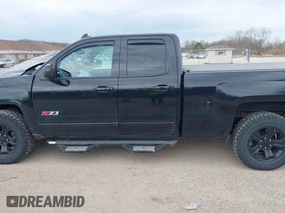 2015 Chevrolet Silverado 1500 LT with VIN 1GCVKREC2FZ427076, listed as a IAAI auction lot 42128553 with 109,776 mi miles and . Bid and sale history available at DreamBid. Image 14.