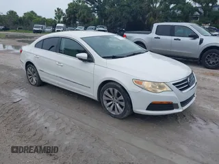 2011 Volkswagen CC Sport z VIN WVWMN7AN2BE711744, wystawiony jako IAAI lot #42416773 z przebiegiem 142 029 mil mil oraz . Historia ofert i sprzedaży dostępna na DreamBid. Obrazek 1.
