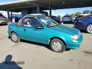 1993 Geo Metro z VIN JG1MR3367PK201491, wystawiony jako Copart lot #41543565 z przebiegiem 61 829 mil mil oraz Tytuł czysty. Historia ofert i sprzedaży dostępna na DreamBid. Obrazek 4.