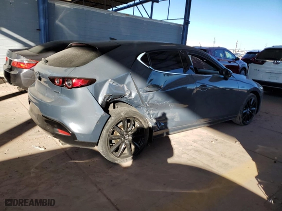 2019 Mazda Mazda3 Hatchback w/Premium Pkg with VIN JM1BPBNM9K1125071, listed as a Copart auction lot 86589954 with 63,157 mi miles and Salvage Title. Bid and sale history available at carsss.com. Image 3.