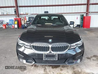 2021 BMW 3 Series 330i xDrive with VIN 3MW5R7J0XM8B58647, listed as a IAAI auction lot 42027965 with 34,230 mi miles. Bid and sale history available at carsss.com. Image 12.