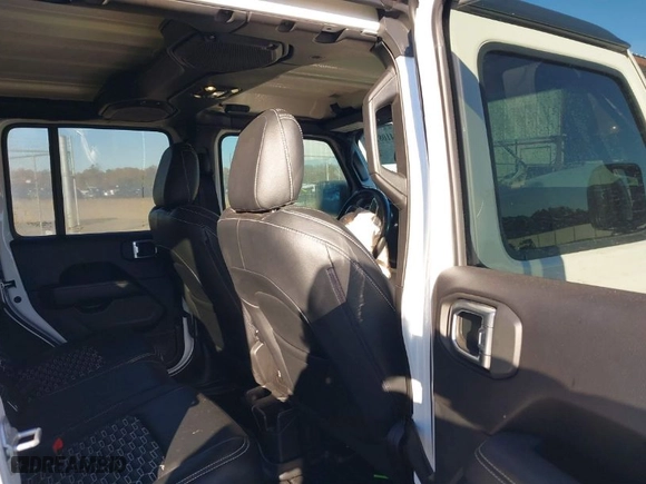 2019 Jeep Wrangler Unlimited Sahara with VIN 1C4HJXEN1KW687924, listed as a IAAI auction lot 41082030 with 65,852 mi miles. Bid and sale history available at carsss.com. Image 8.