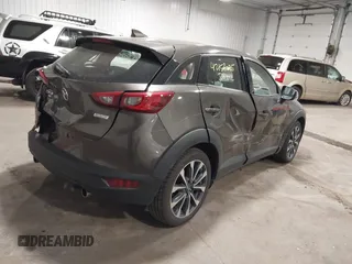 2019 Mazda CX-3 Touring z VIN JM1DKFC79K0442432, wystawiony jako IAAI lot #42153025 z przebiegiem 69 187 mil mil oraz . Historia ofert i sprzedaży dostępna na DreamBid. Obrazek 4.
