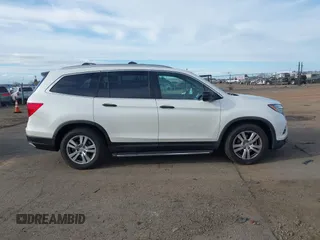 2016 Honda Pilot LX with VIN 5FNYF6H1XGB009768, listed as a IAAI auction lot 41666109 with 137,733 mi miles. Bid and sale history available at carsss.com. Image 13.