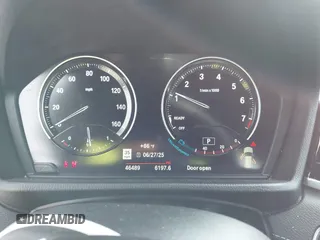 2020 BMW X1 xDrive28i with VIN WBXJG9C08L5R71788, listed as a IAAI auction lot 42604792 with 46,489 mi miles and . Bid and sale history available at DreamBid. Image 7.