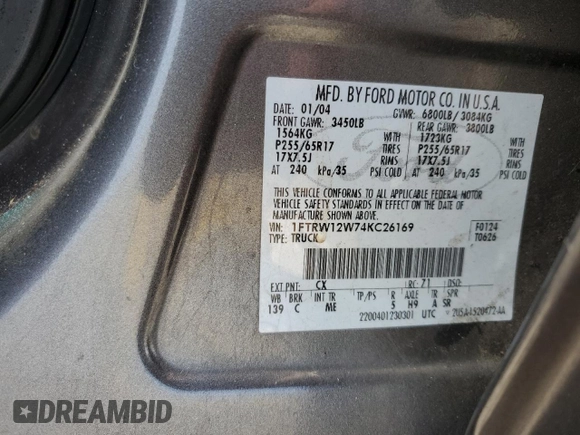 2004 Ford F-150 XLT with VIN 1FTRW12W74KC26169, listed as a Copart auction lot 68393914 with 118,059 mi miles and Salvage Title. Bid and sale history available at DreamBid. Image 12.