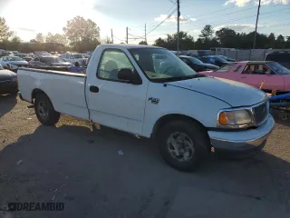 1999 Ford F-150 Work Series with VIN 1FTRF17W5XKA84370, listed as a Copart auction lot 74773754 with 0 mi miles and Salvage Title. Bid and sale history available at carsss.com. Image 4.