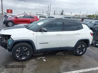 2018 Jeep Compass Trailhawk with VIN 3C4NJDDB0JT306898, listed as a IAAI auction lot 41798954 with 75,852 mi miles and . Bid and sale history available at carsss.com. Image 14.