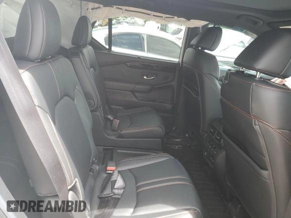 2024 Honda Pilot TrailSport z VIN 5FNYG1H60RB045659, wystawiony jako Copart lot #58575955 z przebiegiem 16 681 mil mil oraz Szkoda całkowita • Salvage title. Historia ofert i sprzedaży dostępna na DreamBid. Obrazek 11.