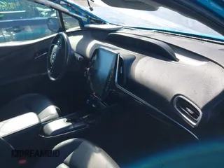 2021 Toyota Prius LE with VIN JTDKAMFP1M3166050, listed as a IAAI auction lot 41831145 with 54,350 mi miles and . Bid and sale history available at DreamBid. Image 5.