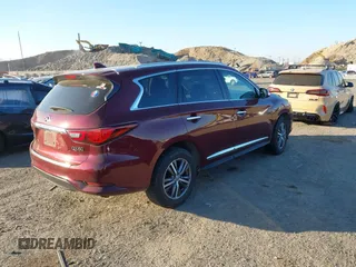 2020 Infiniti QX60 Luxe with VIN 5N1DL0MM0LC511566, listed as a IAAI auction lot 40879519 with 90,479 mi miles and . Bid and sale history available at DreamBid. Image 4.