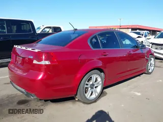 2009 Pontiac G8 with VIN 6G2ER57749L181327, listed as a IAAI auction lot 40772434 with 251,047 mi miles. Bid and sale history available at carsss.com. Image 4.