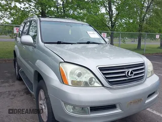 2004 Lexus GX 470 with VIN JTJBT20XX40032417, listed as a IAAI auction lot 42150885 with 180,568 mi miles. Bid and sale history available at carsss.com. Image 1.