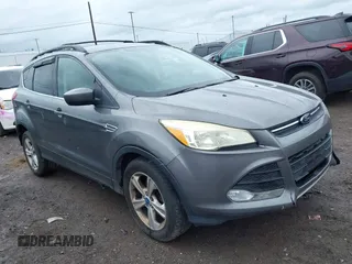 2013 Ford Escape SE z VIN 1FMCU9GX9DUA57901, wystawiony jako IAAI lot #42367615 z przebiegiem 140 000 mil mil oraz . Historia ofert i sprzedaży dostępna na DreamBid. Obrazek 1.