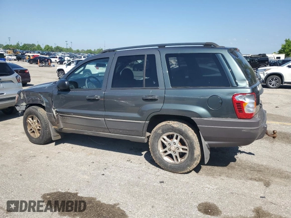 2002 Jeep Grand Cherokee Laredo with VIN 1J4GW48S02C174656, listed as a Copart auction lot 56954155 with 235,427 mi miles and Salvage title. Bid and sale history available at DreamBid. Image 2.