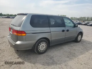 2002 Honda Odyssey LX z VIN 2HKRL18572H531397, wystawiony jako Copart lot #54533535 z przebiegiem 241 052 mil mil oraz Czysty tytuł • Clean title. Historia ofert i sprzedaży dostępna na DreamBid. Obrazek 3.