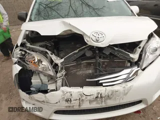 2011 Toyota Sienna XLE AAS with VIN 5TDYK3DC8BS003313, listed as a IAAI auction lot 41830631 with 214,514 mi miles and . Bid and sale history available at DreamBid. Image 6.
