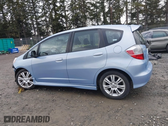 2009 Honda Fit Sport w/Navi with VIN JHMGE886X9S042490, listed as a IAAI auction lot 41931712 with 111,088 mi miles. Bid and sale history available at carsss.com. Image 15.