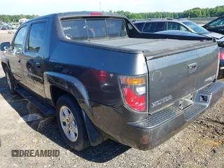2008 Honda Ridgeline RTL z VIN 2HJYK16518H518451, wystawiony jako IAAI lot #42332723 z przebiegiem 295 375 mil mil oraz . Historia ofert i sprzedaży dostępna na DreamBid. Obrazek 3.