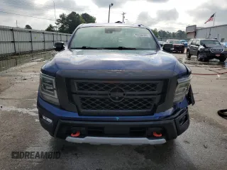 2020 Nissan Titan SL с VIN 1N6AA1ED2LN505013, выставлен на аукционе Copart как лот 56933185 с пробегом 91 342 миль миль и Списание • Salvage title. История ставок и продаж доступна на DreamBid. Изображение 5.