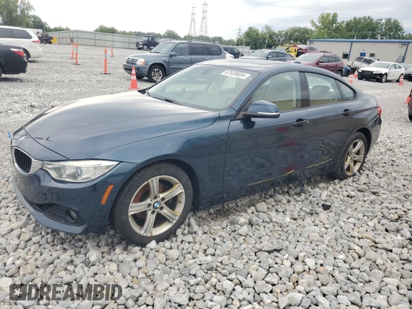 2015 BMW 4 Series 428i xDrive with VIN WBA4C9C57FD330687, listed as a Copart auction lot 67639034 with 114,779 mi miles and Salvage title. Bid and sale history available at DreamBid. Image 1.