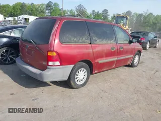 1999 Ford Windstar LX with VIN 2FMZA5140XBA73795, listed as a IAAI auction lot 42094928 with 204,556 mi miles and . Bid and sale history available at carsss.com. Image 4.
