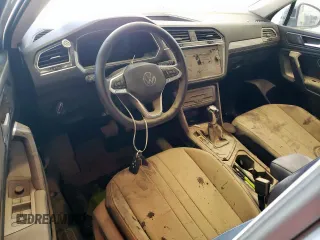 2023 Volkswagen Tiguan SE с VIN 3VVNB7AX6PM014952, выставлен на аукционе Copart как лот 64737925 с пробегом Не указан миль и Списание • Salvage title. История ставок и продаж доступна на DreamBid. Изображение 8.