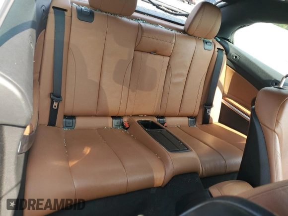 2015 BMW 4 Series 428i with VIN WBA3V7C57FP772880, listed as a Copart auction lot 62740295 with 107,673 mi miles and Salvage title. Bid and sale history available at DreamBid. Image 10.