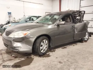 2004 Toyota Camry LE with VIN 4T1BE32K34U903876, listed as a IAAI auction lot 41373506 with 271,963 mi miles. Bid and sale history available at carsss.com. Image 19.