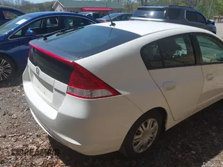 2011 Honda Insight with VIN JHMZE2H30BS012285, listed as a IAAI auction lot 42145139 with 161,672 mi miles and . Bid and sale history available at DreamBid. Image 12.
