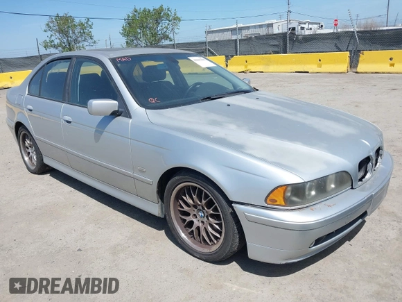 2001 BMW 5 Series 530iA with VIN WBADT63411CF01165, listed as a IAAI auction lot 42101589 with 151,243 mi miles. Bid and sale history available at carsss.com. Image 1.
