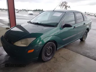2001 Ford Focus LX with VIN 1FAFP33P51W205396, listed as a IAAI auction lot 41563111 with 95,882 mi miles and . Bid and sale history available at carsss.com. Image 2.