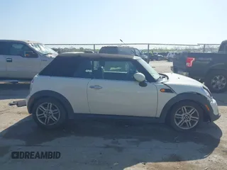2013 MINI Convertible with VIN WMWZN3C58DT568824, listed as a IAAI auction lot 41998124 with 134,191 mi miles and . Bid and sale history available at DreamBid. Image 13.