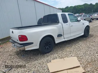 2000 Ford F-150 XL with VIN 1FTRX07W7YKB38454, listed as a IAAI auction lot 42185983 with 260,423 mi miles and . Bid and sale history available at DreamBid. Image 4.
