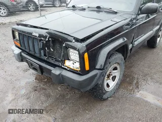 2000 Jeep Cherokee with VIN 1J4FF48S4YL145195, listed as a IAAI auction lot 42302654 with 173,764 mi miles and . Bid and sale history available at DreamBid. Image 6.