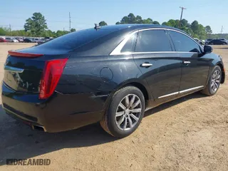 2013 Cadillac XTS Premium with VIN 2G61S5S34D9127996, listed as a IAAI auction lot 41978539 with 185,157 mi miles. Bid and sale history available at carsss.com. Image 4.