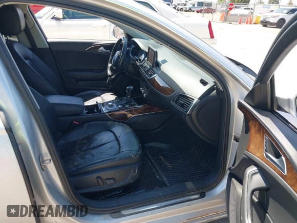 2013 Audi A6 Premium Plus with VIN WAUDFAFCXDN051423, listed as a IAAI auction lot 42249789 with 124,372 mi miles and . Bid and sale history available at DreamBid. Image 5.