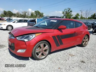 2016 Hyundai Veloster z VIN KMHTC6AD9GU282419, wystawiony jako Copart lot #57078725 z przebiegiem 82 733 mil mil oraz Czysty tytuł • Clean title. Historia ofert i sprzedaży dostępna na DreamBid. Obrazek 1.